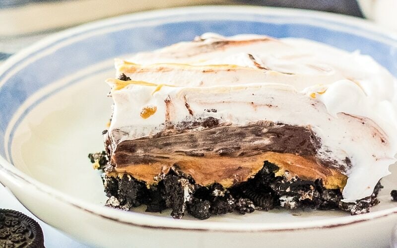 Slice of chocolate peanut butter lasagna on a plate.